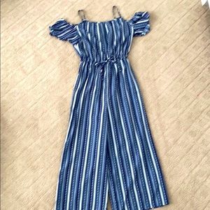 A blue and white jump suit